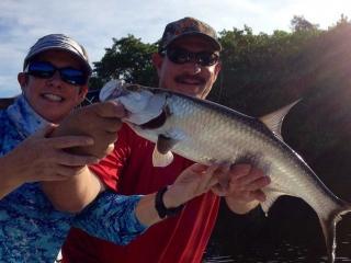 Happy Angler with her first tarpon caught in Fort Myers