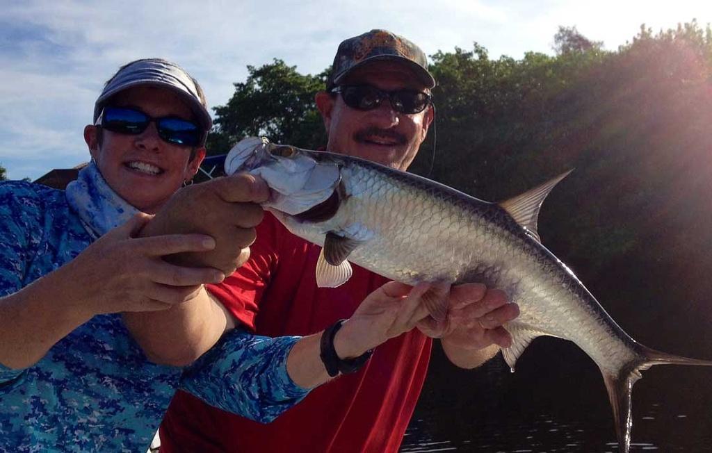 Happy Angler with her first tarpon caught in Fort Myers