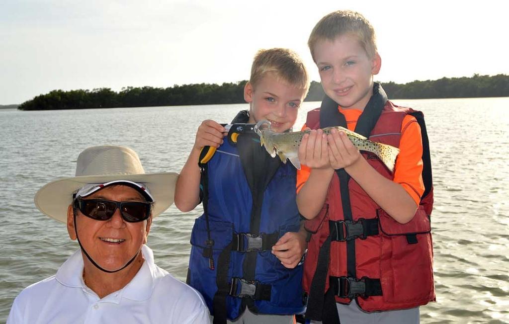 Grandpa Fishing With His Grand Kids In Fort Myers